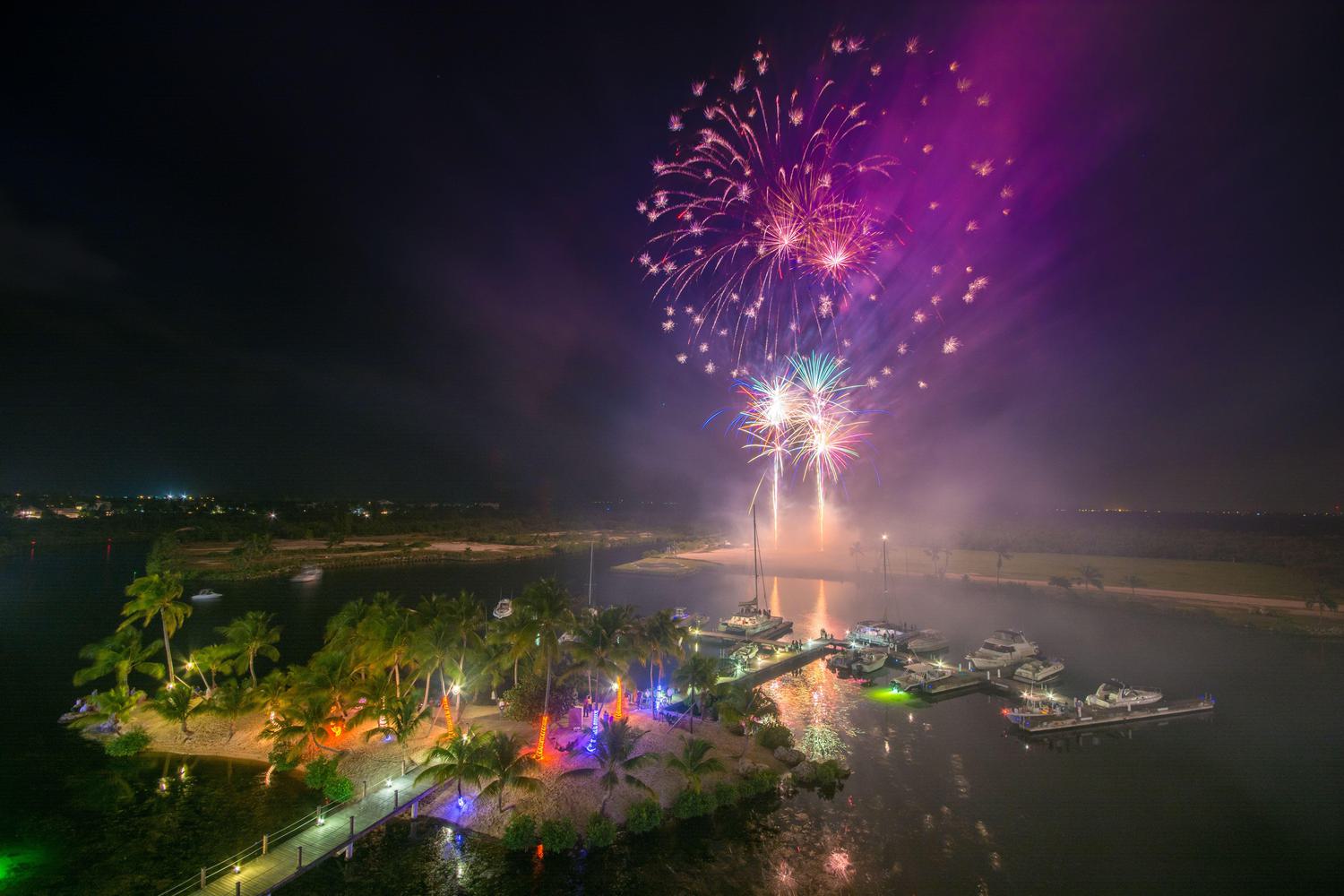 Fireworks at night over camana bay