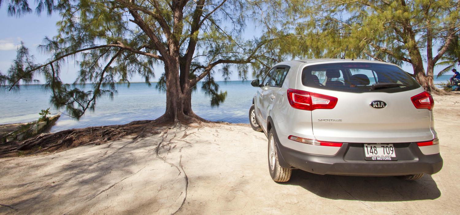 Silver kia sportage parked at governors beach