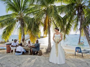 Beautiful bride in Georgetown by the men playing dice