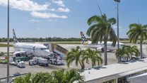 Cayman Airways planes at Owen Roberts Airport