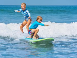 Children surfing