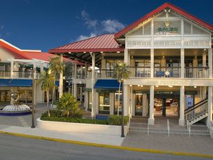Outside of Kirk Freeport Bayshore Mall at twilight in George Town