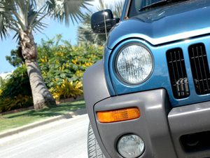 Blue jeep liberty driving