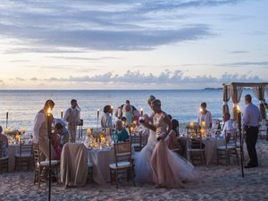 Candlelit sunset wedding on the beach