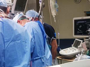 Doctors doing surgery in an emergency room