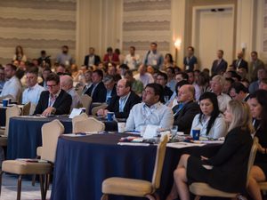 Large group of people sitting in a conference at the ritz hotel