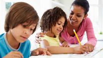 Mom homeschooling kids