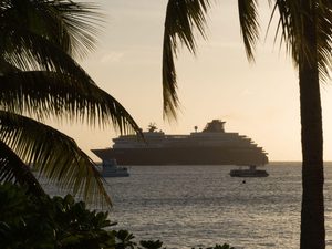 Sunset silhouette of cruise ships in george town