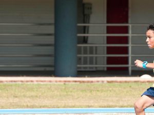 Two youth running in a race